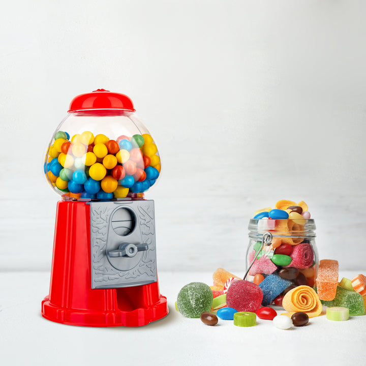Gumball machine featuring a jar filled with candies